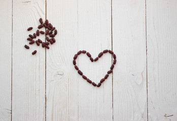 heart on wooden background with copy space for text