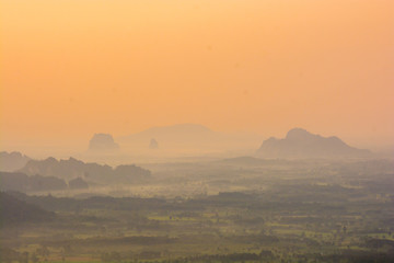 scenery during sunrise time with mountain and savannah field