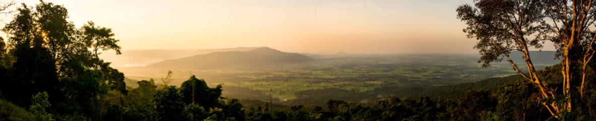 Beautiful panorama scenery during sunrise time with mountain and savannah field in Thailand