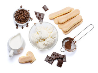 Ingredients for cooking tiramisu - Savoiardi biscuit cookies, mascarpone, cream, sugar, cocoa, coffee and egg