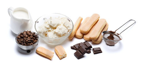 Ingredients for cooking tiramisu - Savoiardi biscuit cookies, mascarpone, cream, sugar, cocoa, coffee and egg