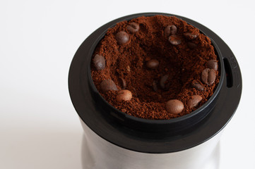 natural coffee in a coffee grinder