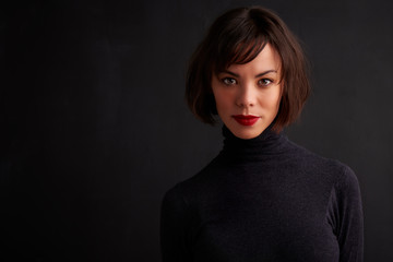 Attractive young woman studio portrait