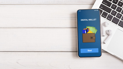 Modern smartphone with digital wallet application and headphones