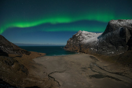 Aurora borealis over Bunes beach, Moskenesoya, Lofoten Islands, Norway