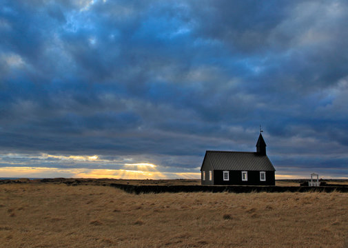 Clouds over secluded church, Iceland