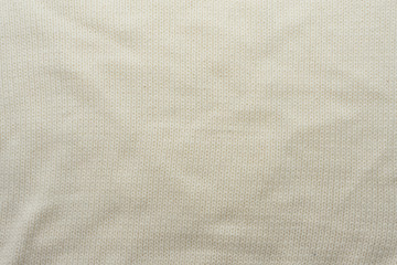Fototapeta na wymiar White crocheted fabric texture, crumped