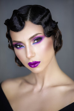 1920 1930 stylization beauty portrait of a young girl of the modern era hairstyle Finger wave make-up color smooky eseys i vinil lips