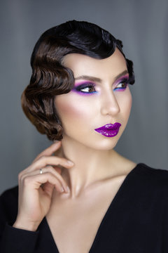 feminine image and films of the 1920s, glamorous girl with purple lips, and Finger wave hairstyle
