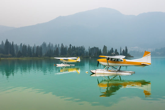 Float planes moored on Green Lake, Whistler, British Columbia, Canada