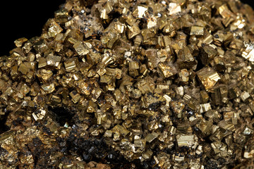 Macro Pyrite mineral stone on a black background