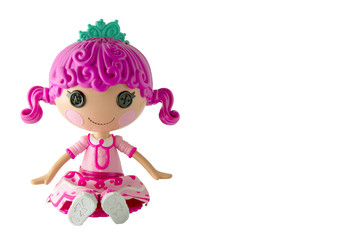 Fototapeta premium Beautiful doll with pink hair isolated on white background. Girl doll toy isolated.