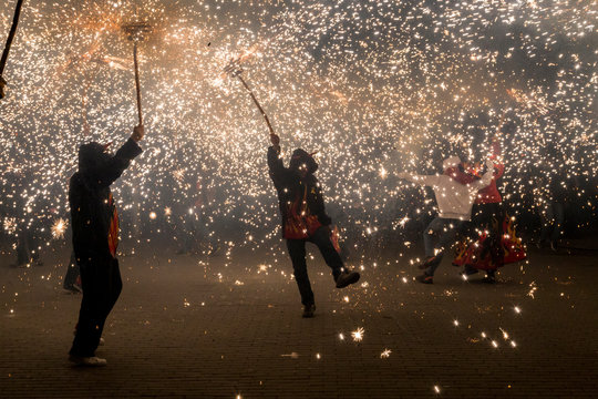 The correfocs is a typical Catalan celebration in which dragons with fireworks dance through the streets.