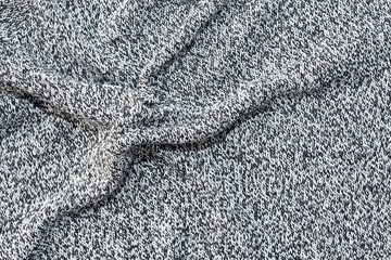 Fototapeta na wymiar Grey and white crocheted fabric texture,crumped