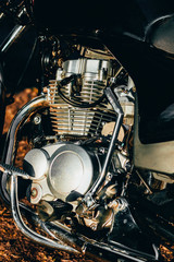 Fototapeta premium motorcycle. the main part of the engine. there is dirt on it. close-up. there is toning.