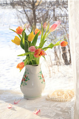 A bouquet of flowers on the window, a wonderful gift for loved ones, the approach of spring