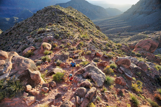 Hikers climb out of Surprise Valley through a break in the 400-foot-tall Redwall on the Thunder River Trail in the Grand Canyon outside of Fredonia, Arizona November 2011. 