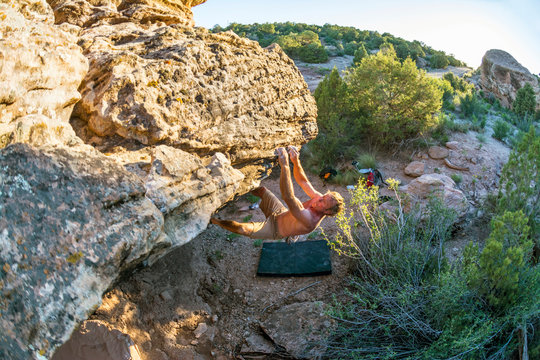 A man bouldering near,  Naturita, Colorado.