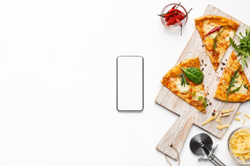 Pizza slices and smartphone with blank screen