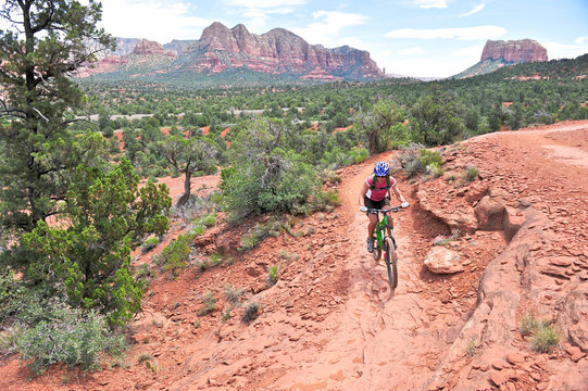 Woman rides the Templeton Trail in South Sedona, Arizona