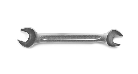 New wrench on white background, top view. Plumber tools