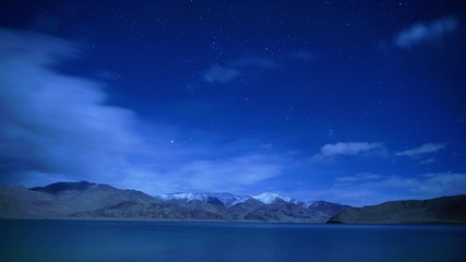 Naklejka na ściany i meble alpine lake in the Pamir, starry sky