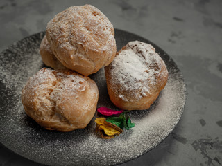 Delicious tender profiteroles with cream