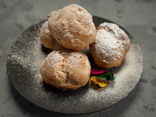 Delicious tender profiteroles with cream