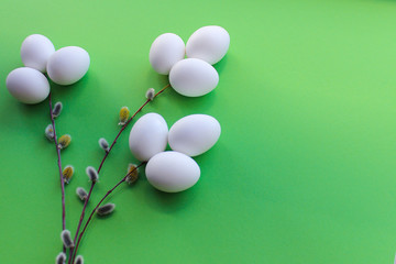 image of a bouquet of flowers of white eggs. green background. the view from the top. photo for Easter cards.