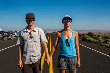 Couple waiting to watch solar eclipse, August 8, 2017, Maupin, Oregon, USA