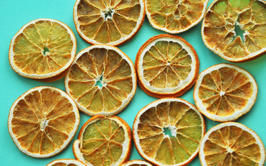 Fototapeta premium Dried oranges on colorful background.