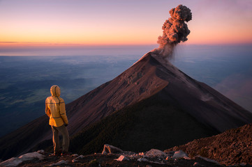 Man watching eruption of Fuego Volcano, Guatemala