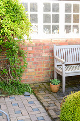Garden bench and outdoor furniture on a patio