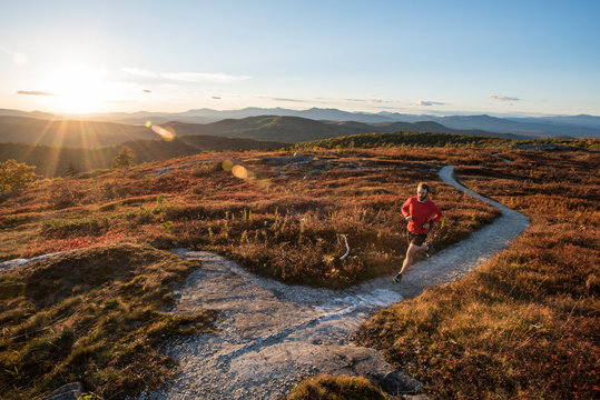 Man jogging on the footpath of the mountain