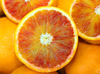 orange cut in the stall of greengrocer