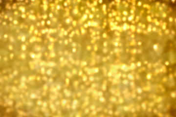 Golden defocused shimmering background