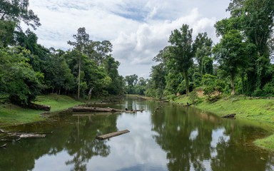 Fototapeta premium The artificial moat surrounding the Bayon site at Angkor Archeological Park