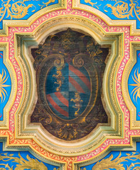 Pope Pius IX coat of arms in the ceiling of the Basilica of Sant'Anastasia near the Palatine in Rome, Italy.