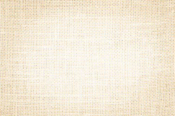 Beige abstract fabric or cream color texture background.