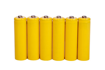 a row of yellow batteries on a white background
