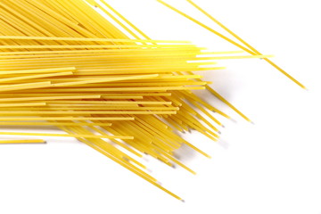 Spaghetti, yellow pasta isolated on white background, top view