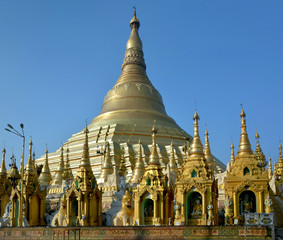 Golden Shwedagon Pagoda shining on the sun. Yangon (Rangoon), Myanmar.