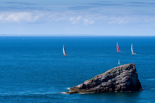Sailing boats racing on sunny day near to Cap Frehel, Brittany, France