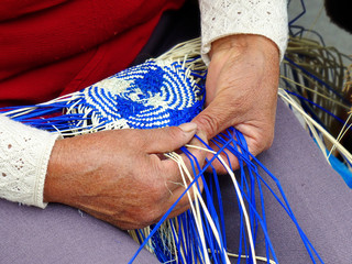 Traditional weaving of ecuadorian Panama Hat or Paja  Toquilla Straw Hats, UNESCO Intangible...