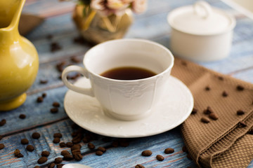 classic coffee cup on a table with elements