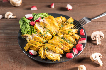 Roasted chicken breasts with vegetables