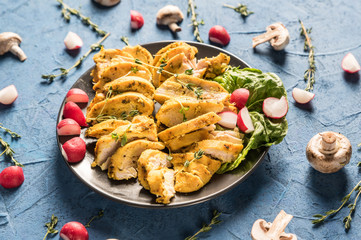 Roasted chicken breasts with vegetables