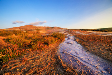 A landscape with Geysir, one of the biggest attraction of Iceland