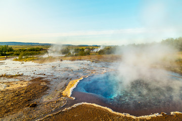 A landscape with Geysir, one of the biggest attraction of Iceland