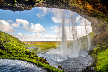 View of Seljalandsfoss one of most stunning waterfalls in Iceland - obrazy, fototapety, plakaty